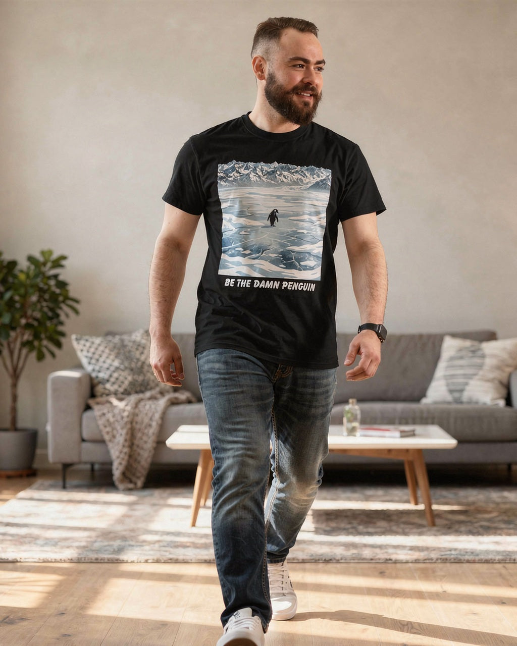 Be the Damn Penguin black graphic tee worn in a relaxed indoor look