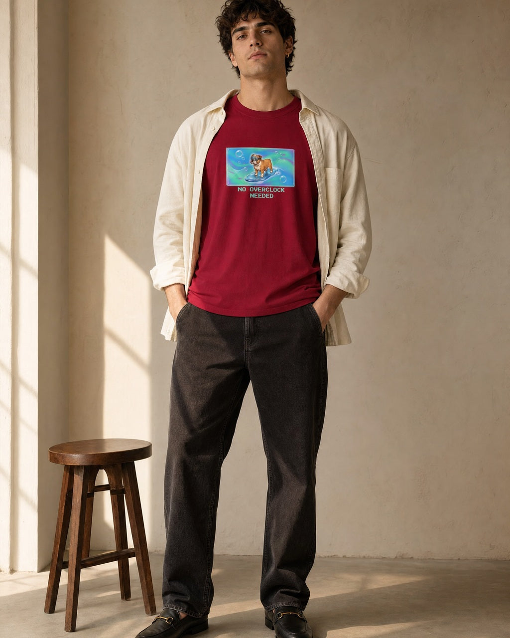 O's Tees No Overclock Needed Bulldog Frutiger Aero Dogs graphic tee lifestyle image — Cardinal Red shirt, male shot 02, black jeans cream overshirt
