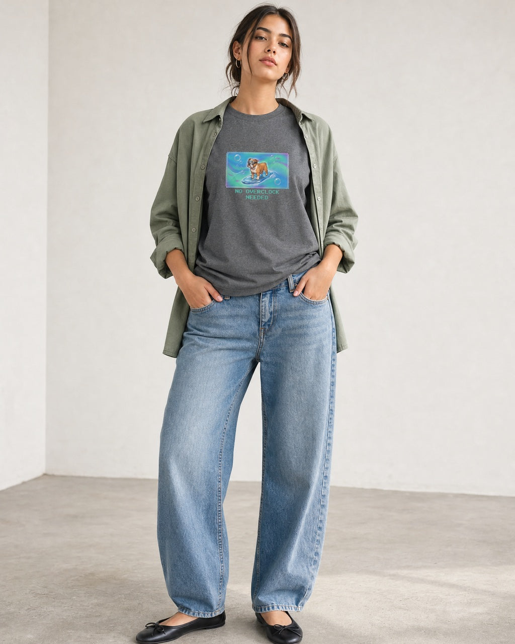O's Tees No Overclock Needed Bulldog Frutiger Aero Dogs graphic tee lifestyle image — Graphite Heather shirt, female shot 01, washed blue denim sage