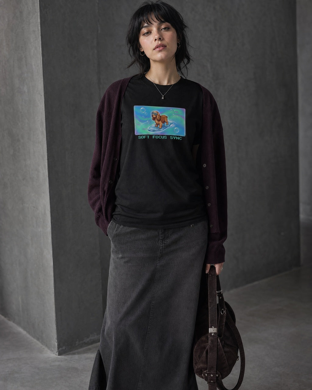 O's Tees Soft Focus Sync Cocker Spaniel Frutiger Aero Dogs graphic tee lifestyle image — Black shirt, female shot 02, charcoal maxi plum