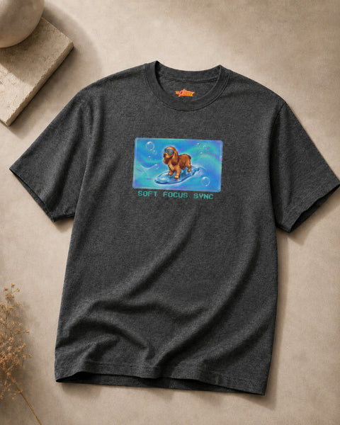 O's Tees Soft Focus Sync Cocker Spaniel Frutiger Aero Dogs graphic tee — tabletop primary product image