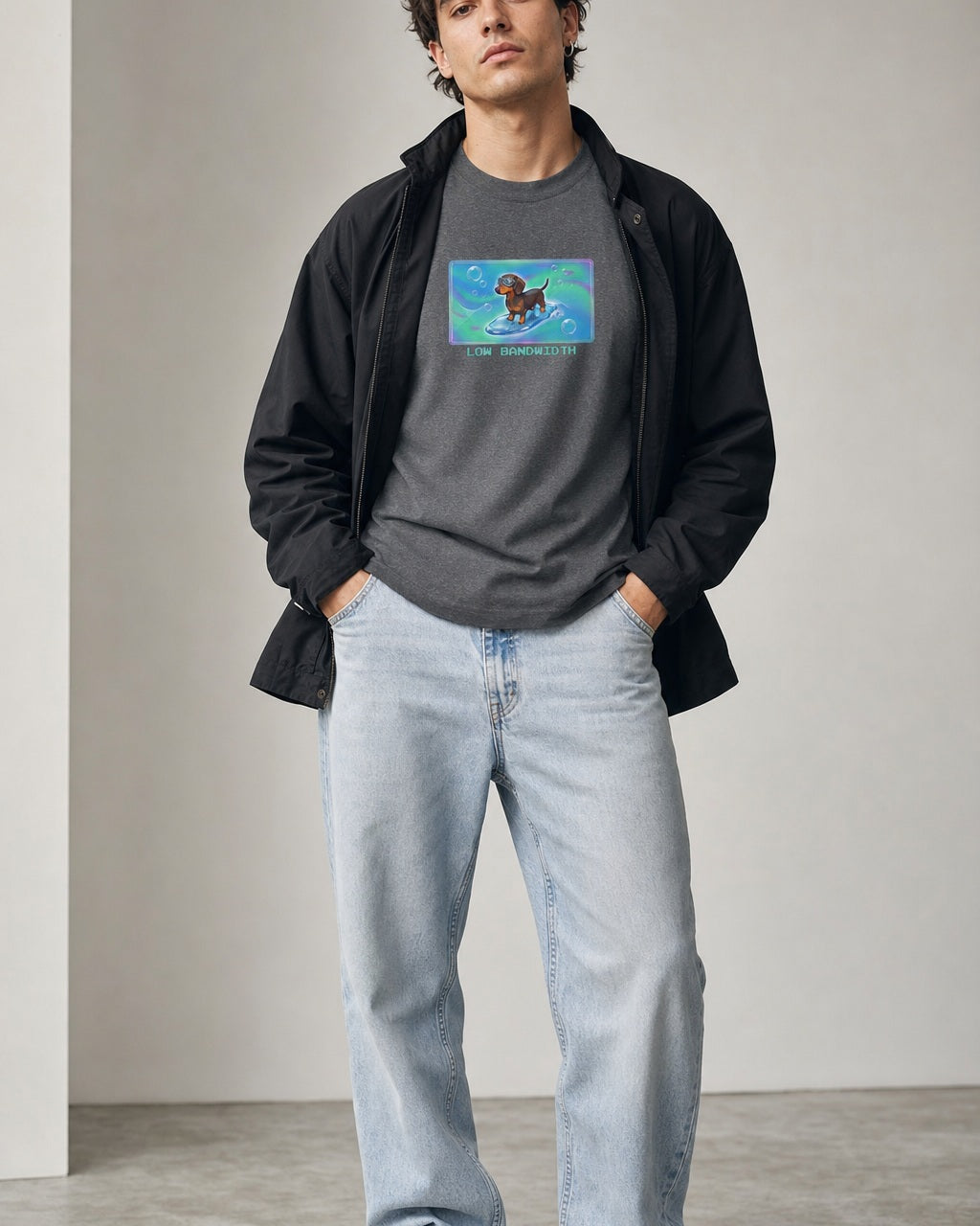 O's Tees Low Bandwidth Dachshund Frutiger Aero Dogs graphic tee lifestyle image — Graphite Heather shirt, male shot 02, light denim black field
