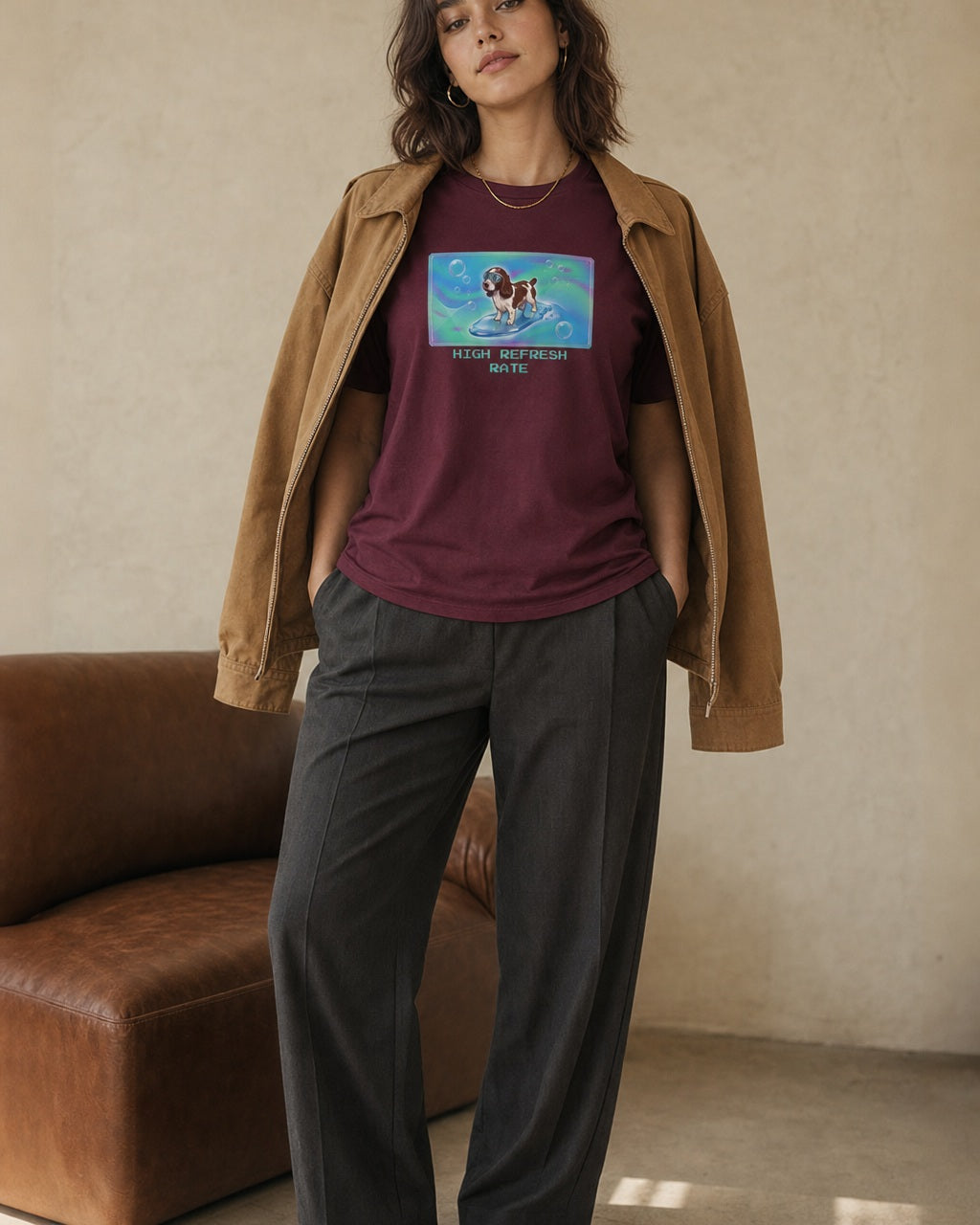 O's Tees High Refresh Rate English Springer Spaniel Frutiger Aero Dogs graphic tee lifestyle image — Maroon shirt, female shot 02, charcoal trouser camel