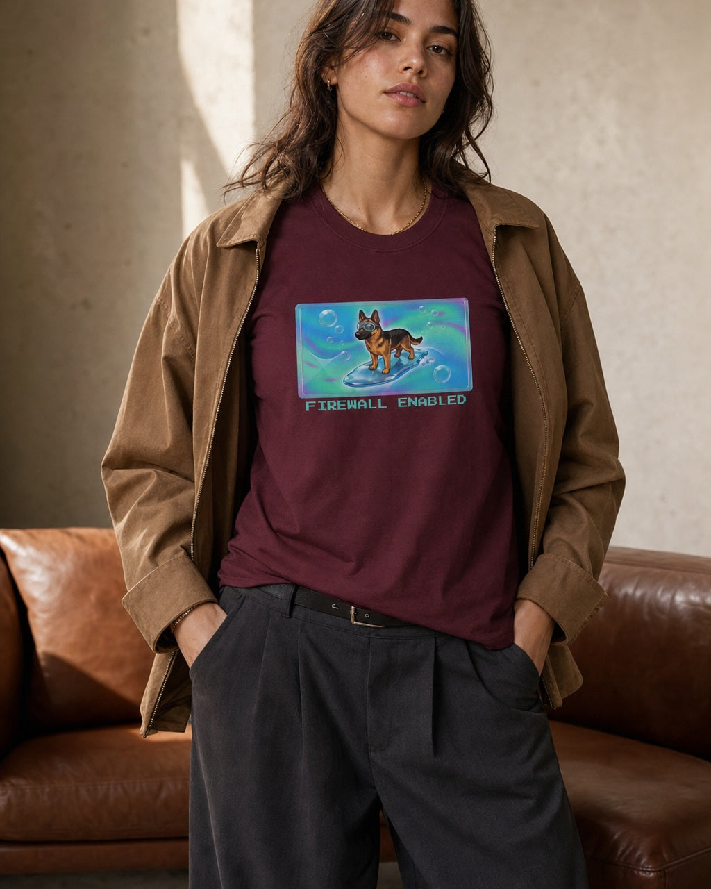 O's Tees Firewall Enabled German Shepherd Frutiger Aero Dogs graphic tee lifestyle image — Maroon shirt, female shot 02, charcoal trouser camel
