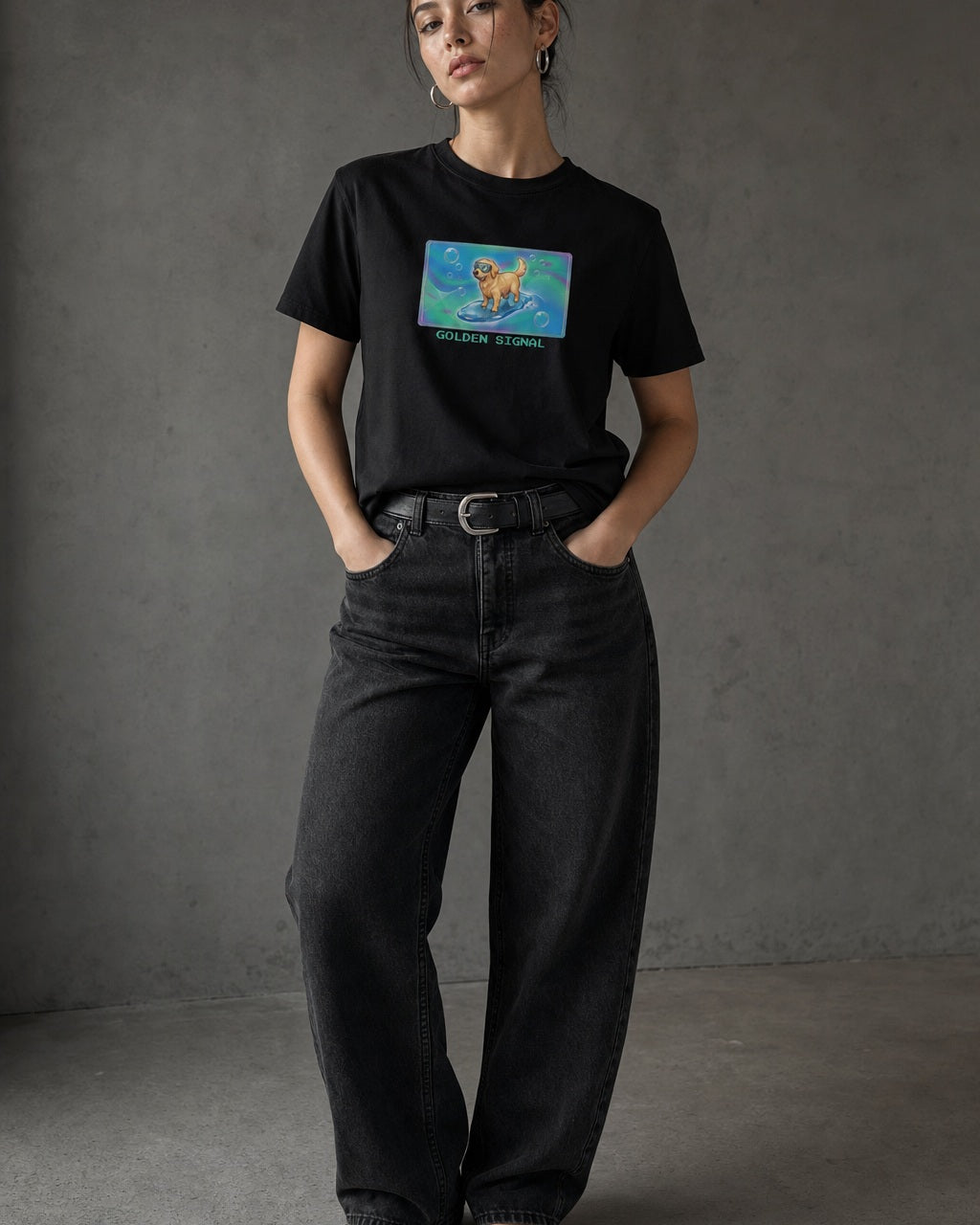 O's Tees Golden Signal Golden Retriever Frutiger Aero Dogs graphic tee lifestyle image — Black shirt, female shot 01, washed black denim