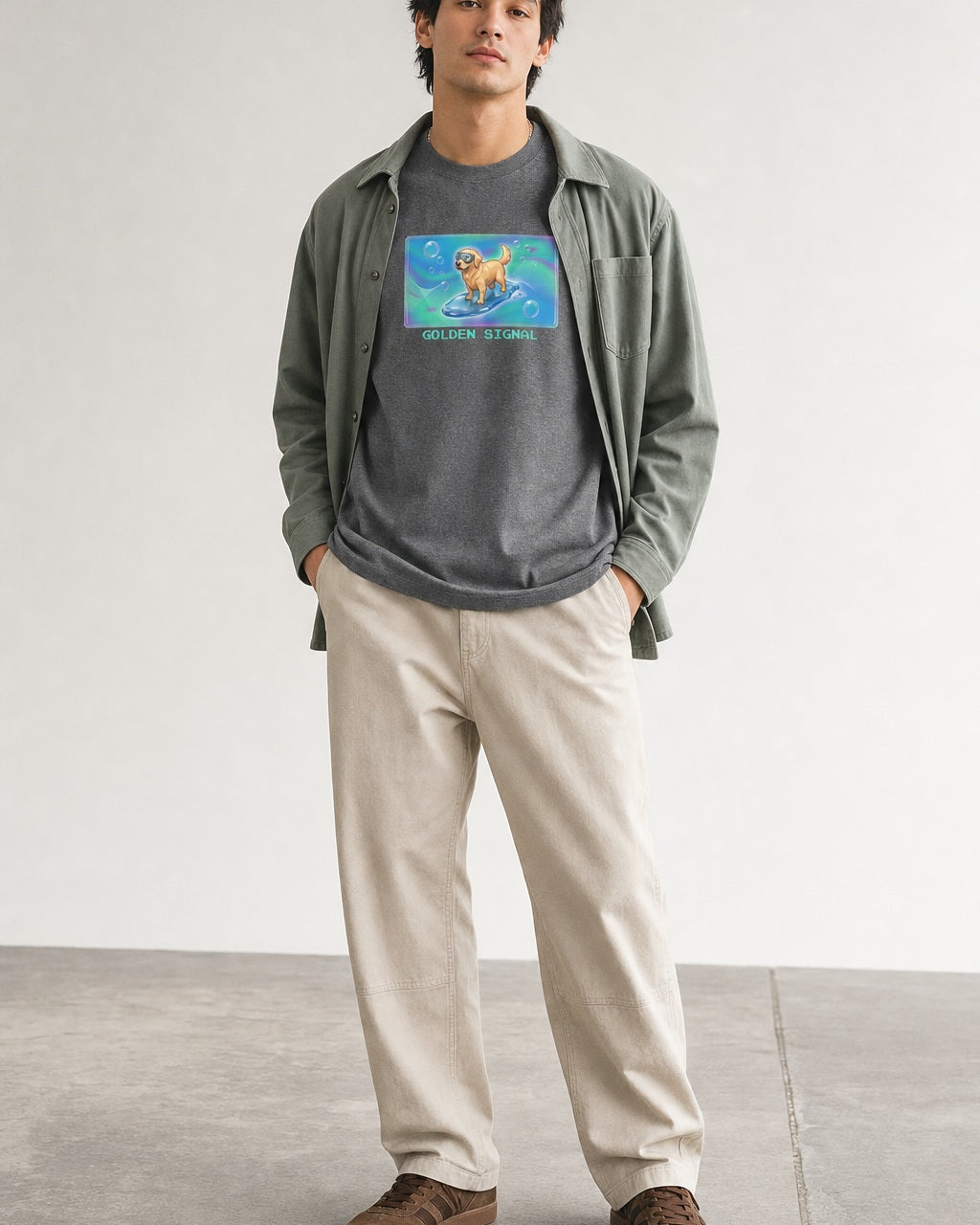 O's Tees Golden Signal Golden Retriever Frutiger Aero Dogs graphic tee lifestyle image — Graphite Heather shirt, male shot 01, stone trouser sage overshirt