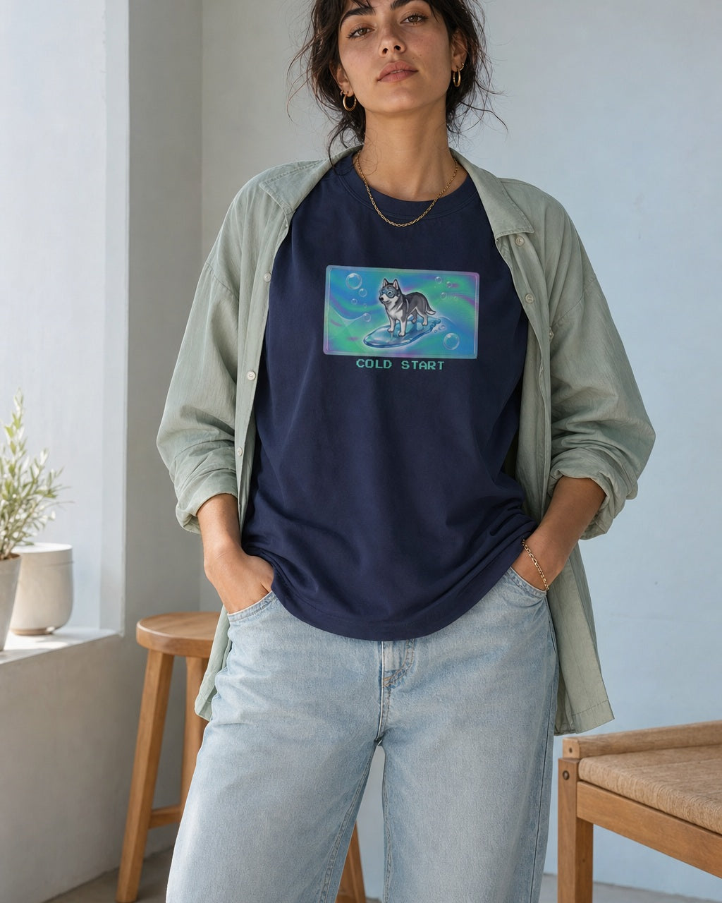 O's Tees Cold Start Husky Frutiger Aero Dogs graphic tee lifestyle image — Navy shirt, female shot 02, lightwash sage