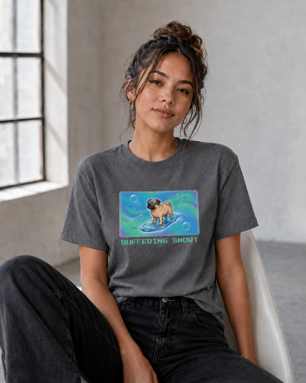 O's Tees Buffering… Snort Pug Frutiger Aero Dogs graphic tee lifestyle image — Graphite Heather shirt, female shot 03, no-phone editorial